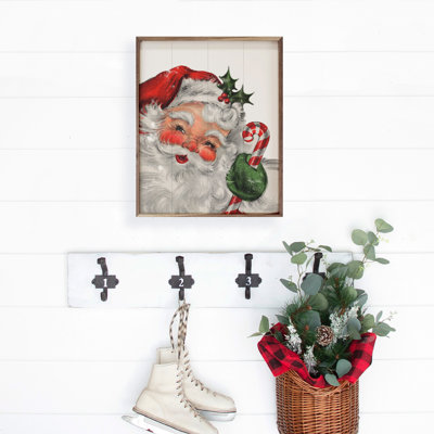 Père Noël avec canne en bonbon