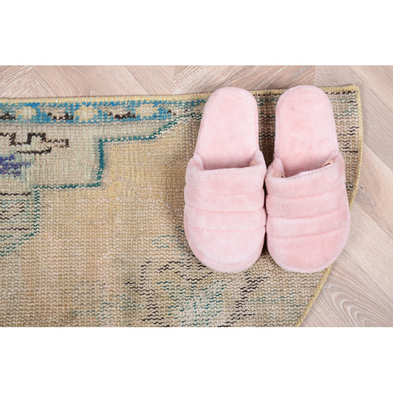 Unique Vintage Turkish Rug in Pastel Tones Featuring Subtle Patterns and Half-Circle Design for Cozy Home