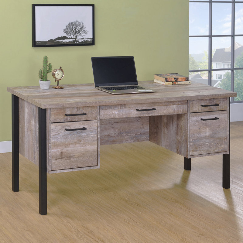 Bureau en chêne patiné à 4 tiroirs