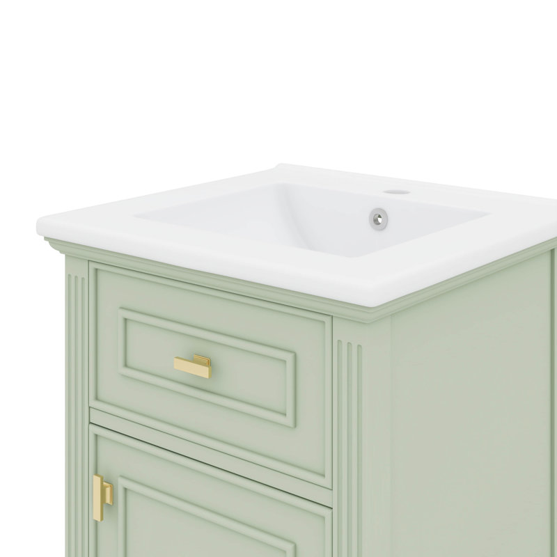 L'ensemble de meuble-lavabo de salle de bain élégant de 20 pouces est livré avec un tiroir inclinable, une tablette polyvalente et un support de rangement