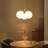 Lumora 3-Light Dimmable Glass Globe Pendant