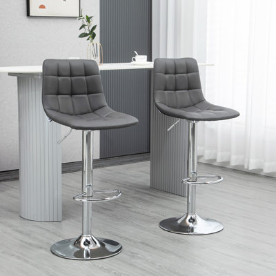 Jannine Swivel Upholstered Adjustable Height Counter Stool with Metal Frame