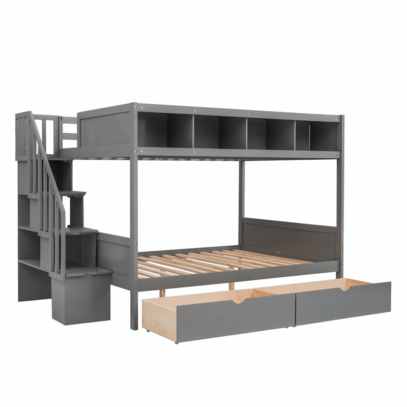 Lit simple superposé au dessus d'un lit double avec tiroirs pour enfants