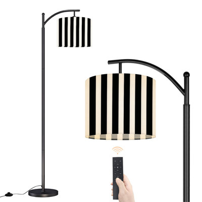 Lampe sur pied à arc avec abat-jour réglable noir et blanc avec rayures verticales et design minimaliste