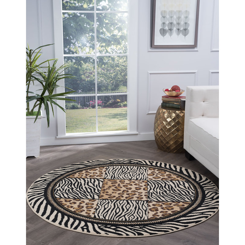 Tapis brun / noir à motif animalier Alfonsia, Rond 7 pi 10 po