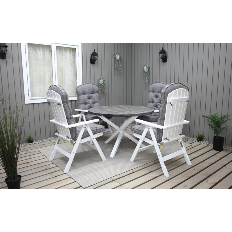 Capuano 4 - Person Wood Patio Dining Set with Round Table , Cushions Included, Grey