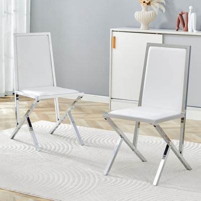 Ensemble de 2 chaises de salle à manger en polyuréthane blanc avec cadre en métal argenté: design ergonomique, un choix simple et luxueux. Comprend des pieds en métal argenté de conception unique.