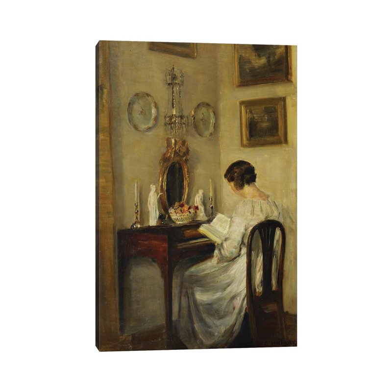 An Interior With A Girl Reading At A Desk by Carl Holsoe - Wrapped Canvas Gallery-Wrapped Canvas Giclée