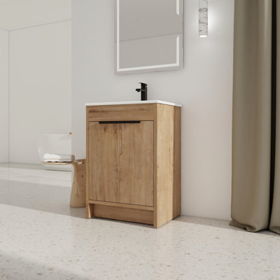 Meuble-lavabo autoportant de 24 po avec lavabo en céramique. Fabrication en contreplaqué. 2 portes à fermeture en douceur. Conception moderne pour la salle de bain. Largeur. Contreplaqué.