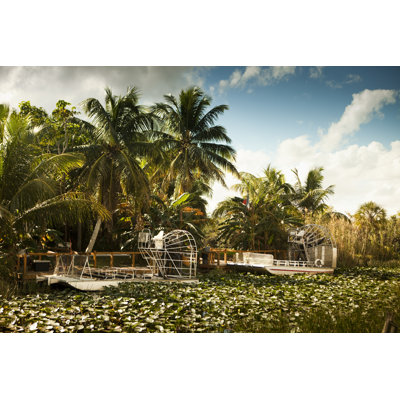Air Boat Glides Into The Wetlands by Pgiam