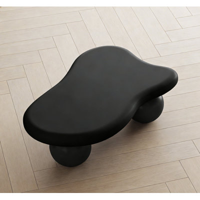 Table basse en forme de nuage avec 3 pieds sphériques pour le salon