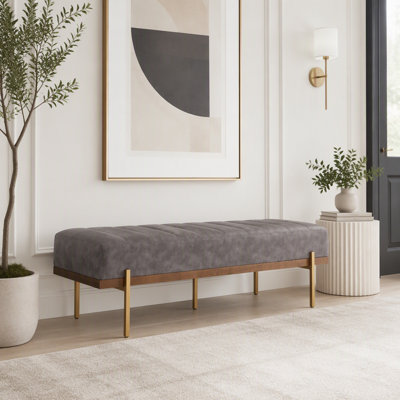 Banquette rembourrée capitonnée avec pieds dorés