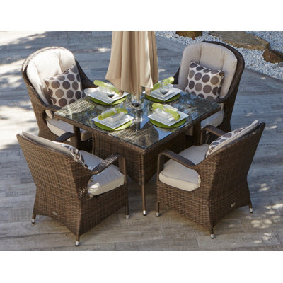 Axl 4 - Person Wicker Patio Dining Set with Square Table