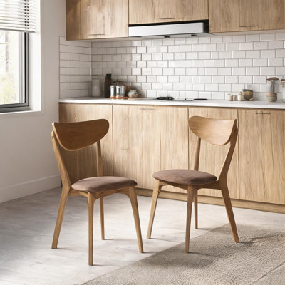 Deux chaises de salle à manger élégantes : ensemble de chaises d'appoint en bois de style moderne du milieu du siècle, avec dossier incurvé et assise rembourrée, pour la cuisine et la salle à manger.