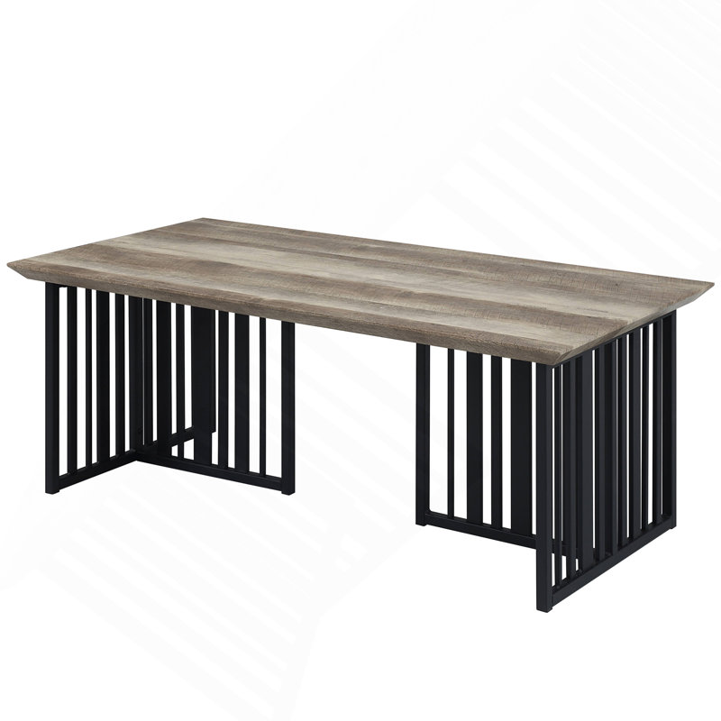 Table basse en chêne antique et noir avec base en métal.