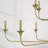 56" W x 35" H 10-Light Two-Tier Chandelier in Aged Brass with Flared Candlesticks