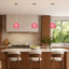 Luminaire suspendu simple en forme de globe en fil de fer rose à finition chromée pour îlot de cuisine