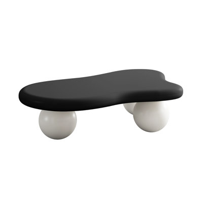 Table basse en forme de nuage avec 3 pieds sphériques pour salon