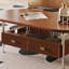 Table basse simple en bois massif de forme ovale