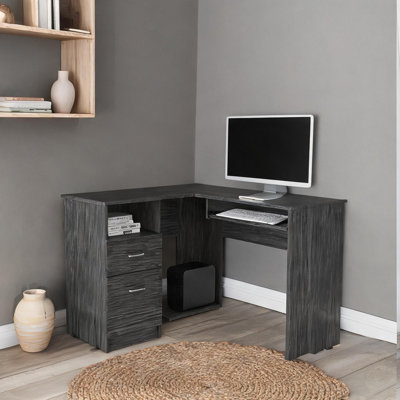 Bureau de direction en L gris neutre avec plateau pour clavier, deux tiroirs et tablette ouverte pour le bureau à domicile