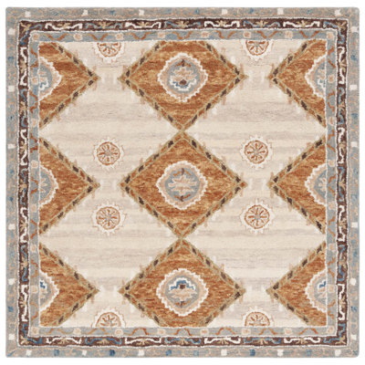 Arkadijus Southwestern Handmade Tufted Area Rug in Brown / Blue