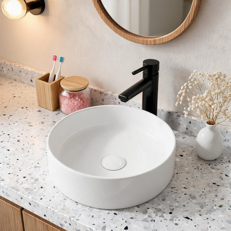 Vasque à poser ronde en céramique blanche de 38 cm (15 pouces) avec finition émaillée et lavabo à poser.