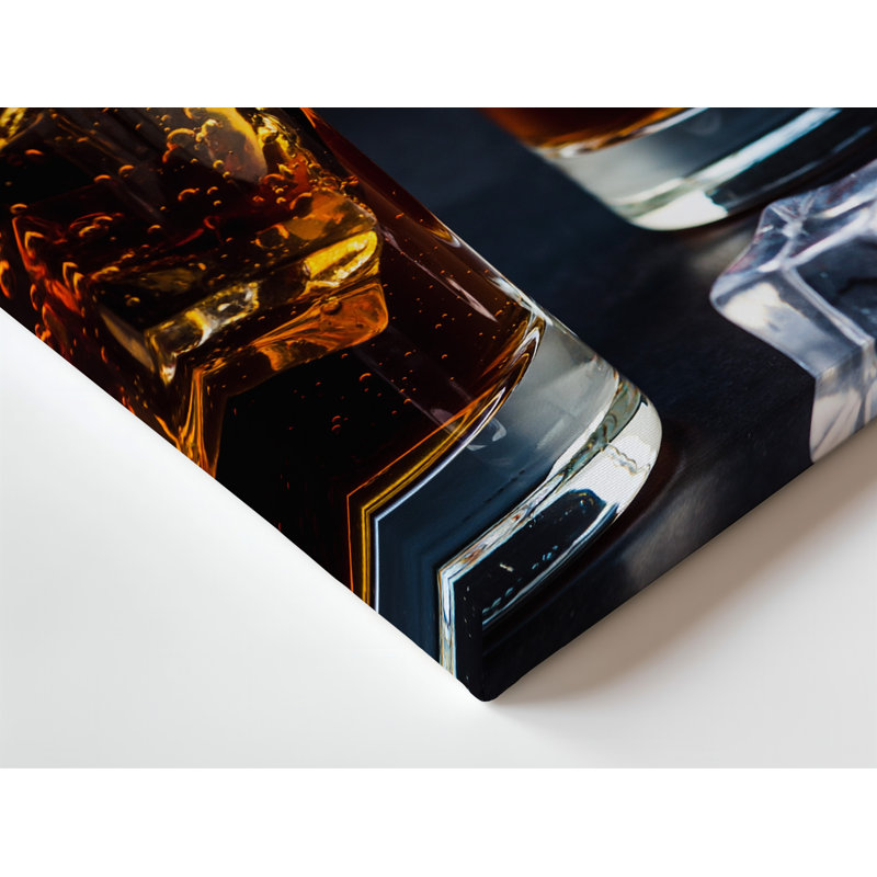 Canvas Two Crystal Clear Glasses Overflowing With Dark Amber Liquid Stand Wall Art Out Dramatically Against A Velvety Black Background Canvas Wall Art