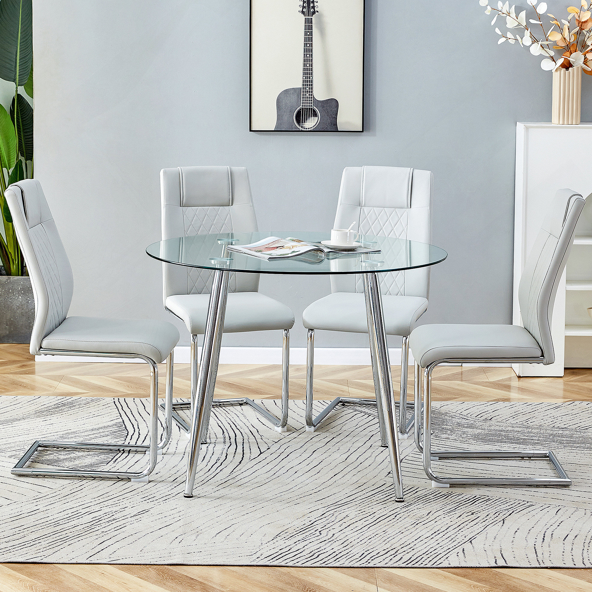 Ivy Bronx Table and chair set.A 38.6" Diameter Transparent Tempered ...