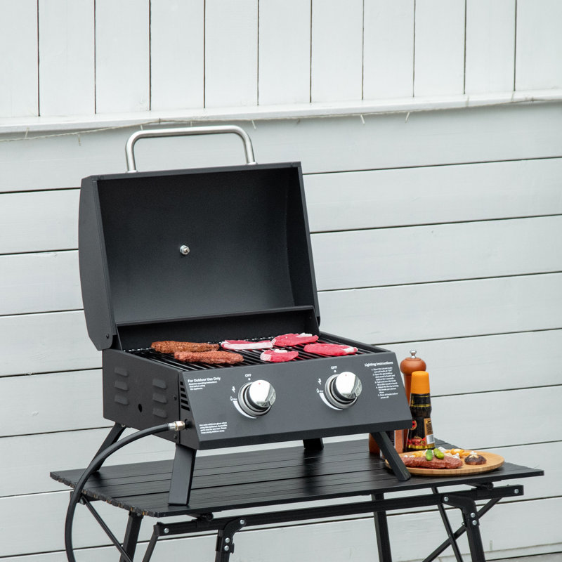 Barbecue à gaz portatif, 2 brûleurs au propane. Pieds pliables pour le rangement. Couvercle et thermomètre inclus. Noir. Parfait pour le camping, les pique-niques et le barbecue dans le jardin. Transport facile.