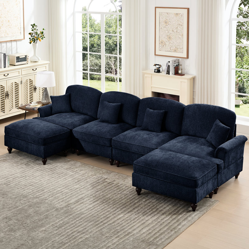 Canapé modulaire en chenille bleu à 4 places avec accoudoirs évasés, jupes de plis à volants détachables et pieds fuselés, coussin décoratif doux et confortable avec repose-pieds Cloud
