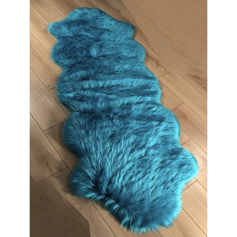 Tapis turquoise en polyester touffeté à la machine Novelty Natal, Nouveauté 2 pi 6 po x 4 pi 11 po