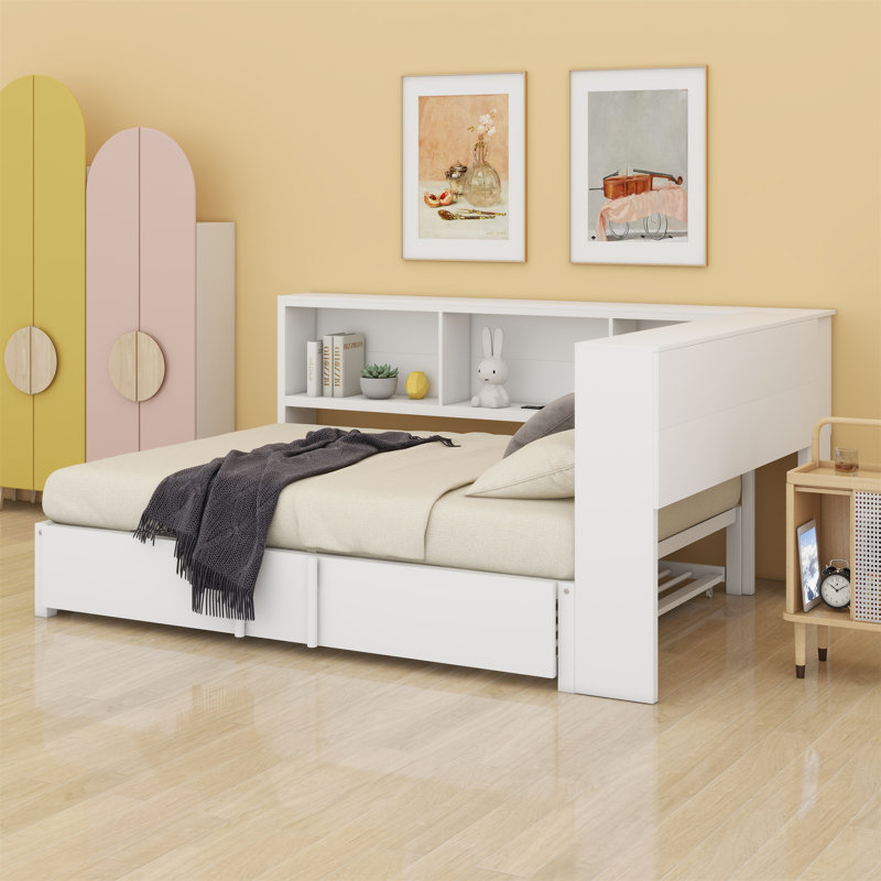 A Full-Sized Metal Daybed That Includes An Integrated Pull-Out Trundle And Built-In Storage Compartments, White