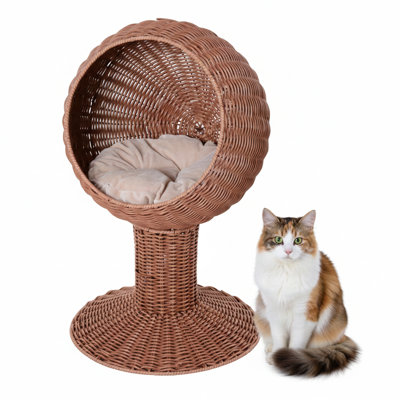 Elevated feline bed designed as a rotatable egg-shaped pod. Features a thick cushion for comfort. Constructed from woven natural mat grass resembling a small house. Finished in brown.