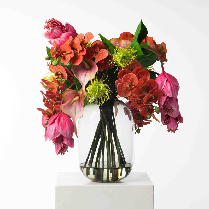 Isle of Magnifica Orchid Floral Arrangements in Vase