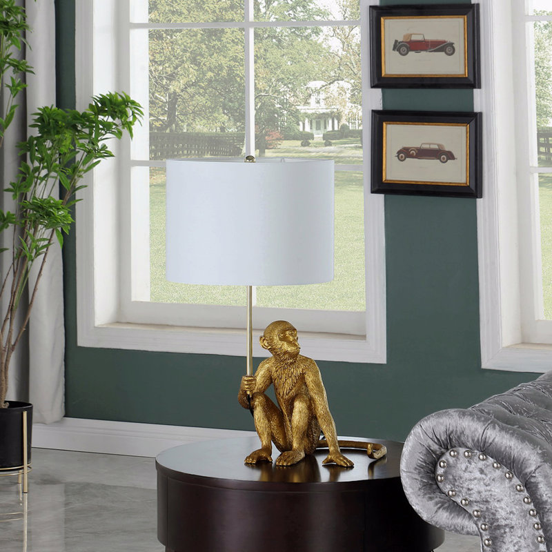 Lampe de table 25,50 "en singe doré tenant une polyrésine