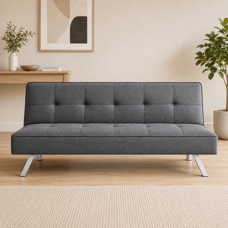 Canapé-lit pliant en tissu gris pour la maison - un style polyvalent pour le salon qui bascule facilement d'un canapé à un lit.