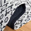Tapis géométrique en laine et en coton tissé à la main en ivoire / noir Marbella-611334543