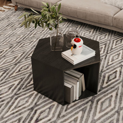 Table basse hexagonale en bois Otera avec espace de rangement.