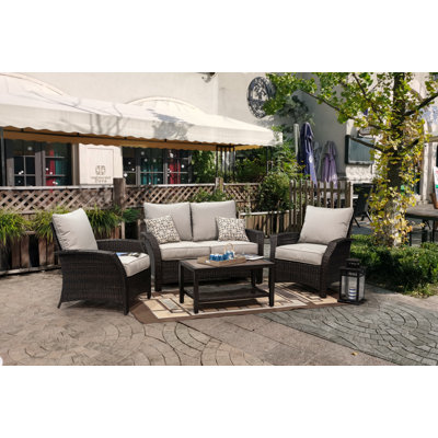 Braxter Williamsport 4 Piece Rattan Complete Patio Set with Cushions by Red Barrel Studio