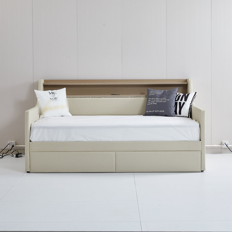 Lit de jour simple beige avec compartiments de rangement, station de charge et station à vêtements à lumières à intensité variable, ambiance de revêtement