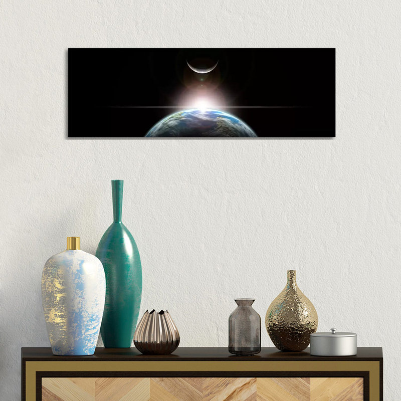 A Star Rising Over An Earth-Like Planet And Illuminating Its Lone Moon by Marc Ward - Wrapped Canvas Panoramic Print
