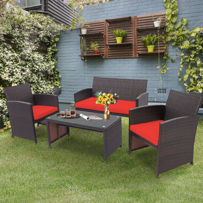 Glass Table Top and Wicker 4 - Person Patio Conversation Set with Cushions
