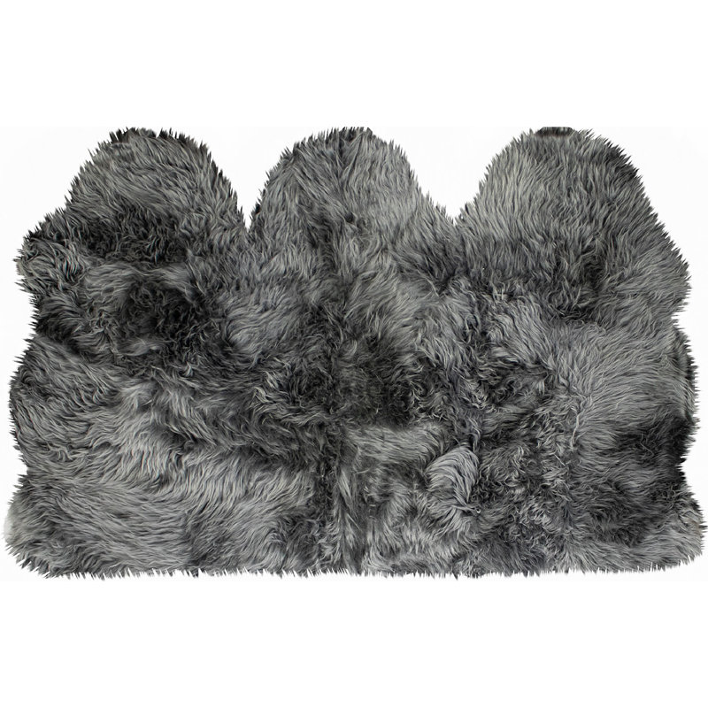 Tapis gris en peau de mouton fait à la main Cyanne