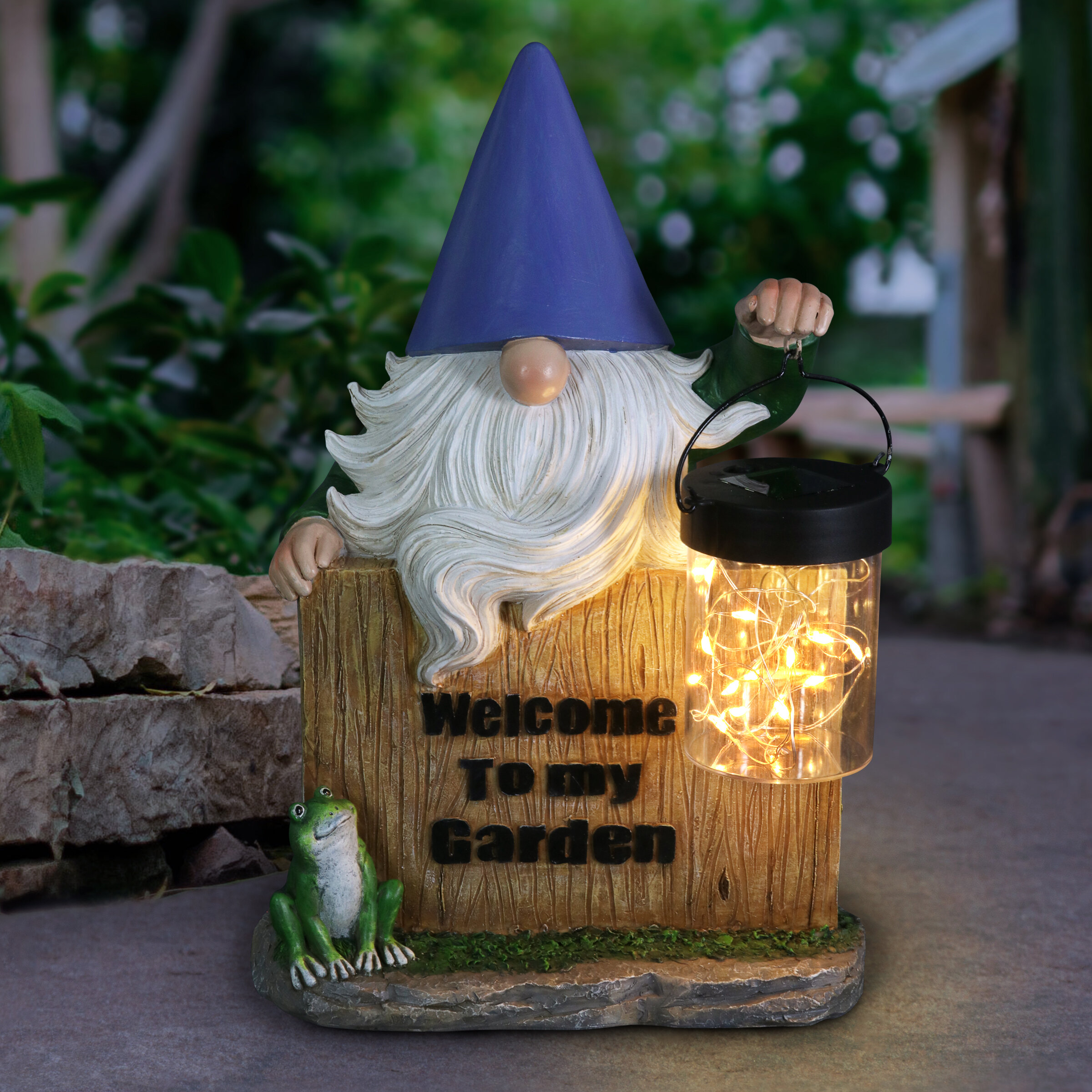 https://assets.wfcdn.com/im/76981424/compr-r85/1929/192962506/exhart-solar-hand-painted-gnome-statue-with-a-lantern-jar-of-led-fireflies-by-a-welcome-fence.jpg