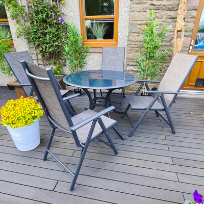 Eleni 4 - Person Patio Dining Set with Round Table