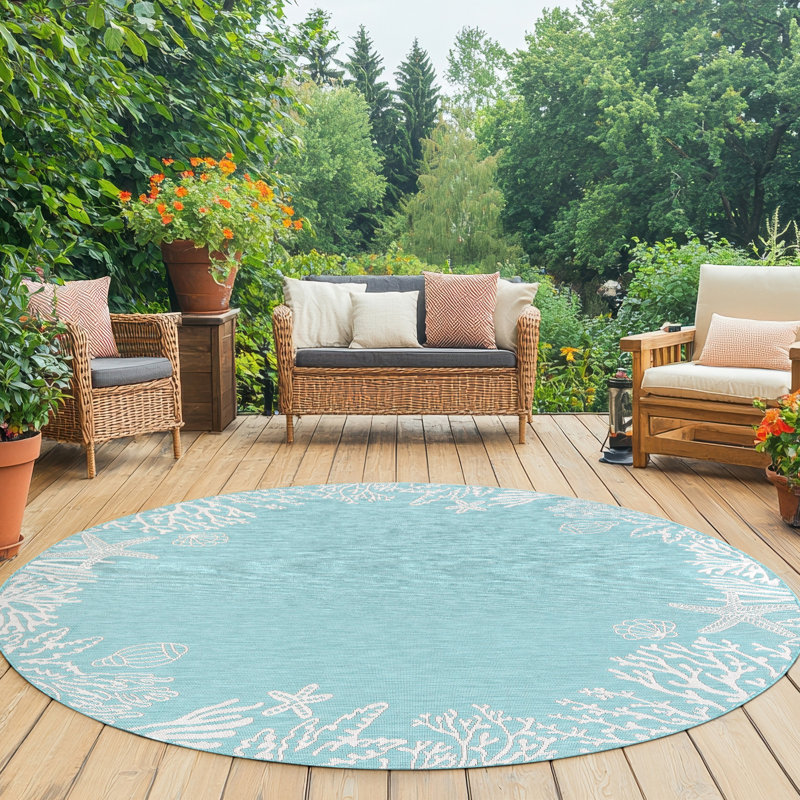 Tapis turquoise à imprimé animal Zendaya, Rond 7 pi 10 po
