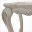 Table basse Bone White avec pattes surdimensionnées et motifs floraux pour le salon, style stable et intemporel