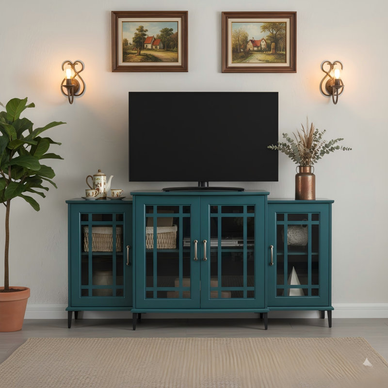 Ce meuble télé de 62 pouces sert également de buffet ou de buffet dans une finition bleu sarcelle.