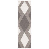 Charvik Geometric Handmade Area Rug in Ivory/Beige