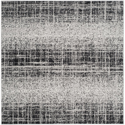 Riebe Abstract Silver/Black Area Rug